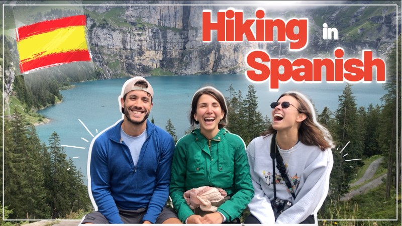 Three people laughing in front of Switzerland mountains